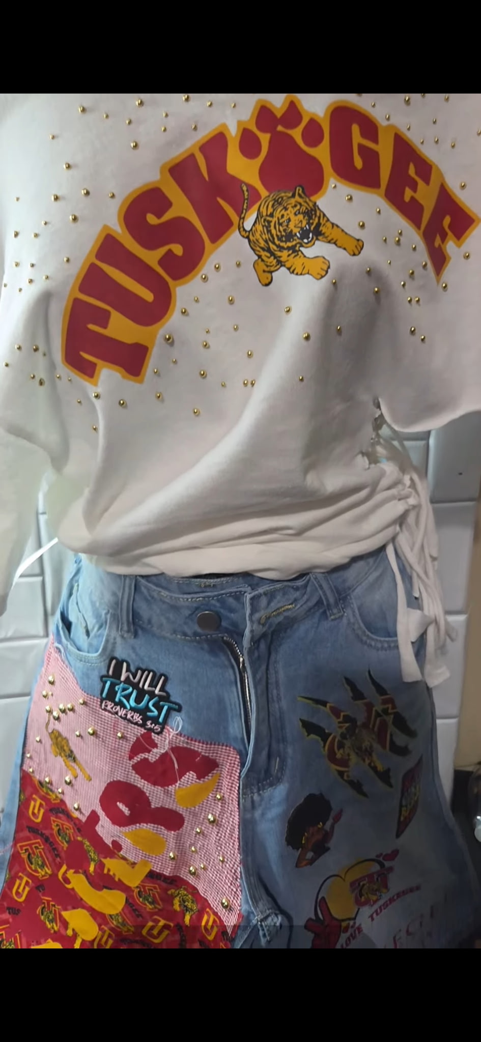 Tuskegee-inspired custom shirt and embellished jeans by Cx² Designs